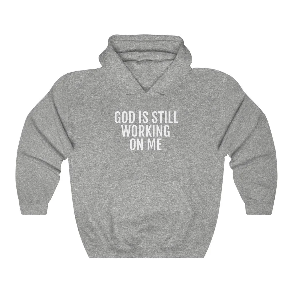 He's still Working - Unisex Heavy Blend™ Hooded Sweatshirt
