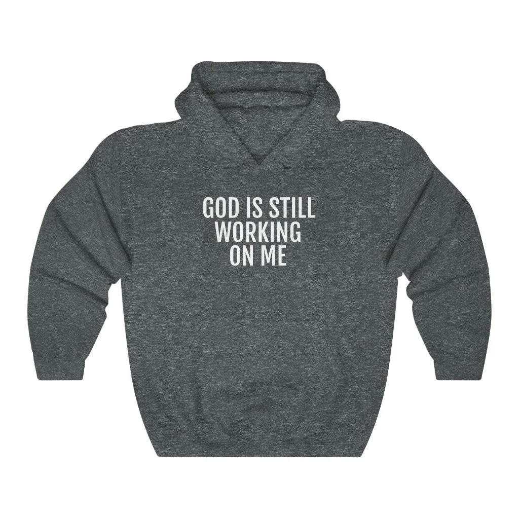 He's still Working - Unisex Heavy Blend™ Hooded Sweatshirt