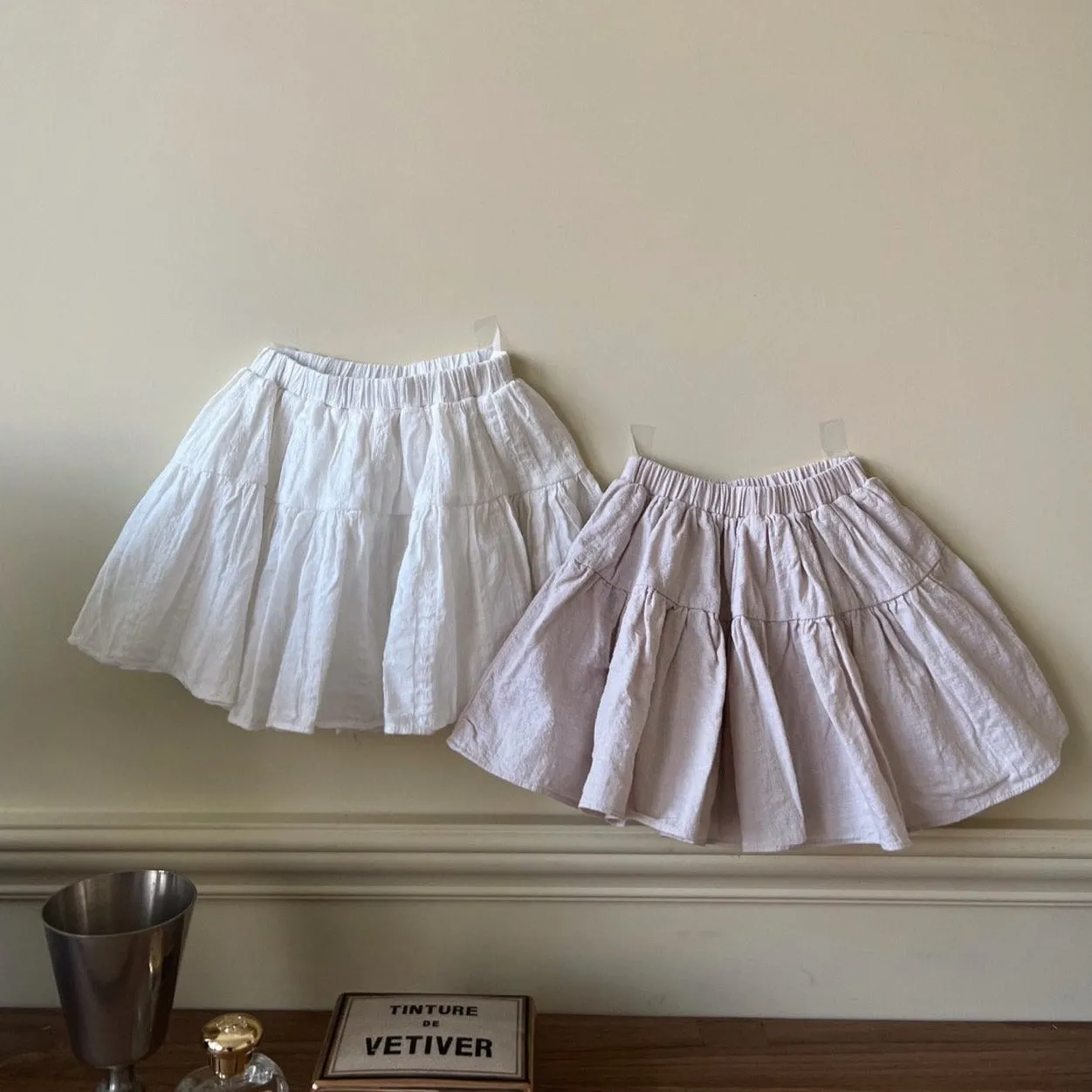 Ines Skort, Ivory