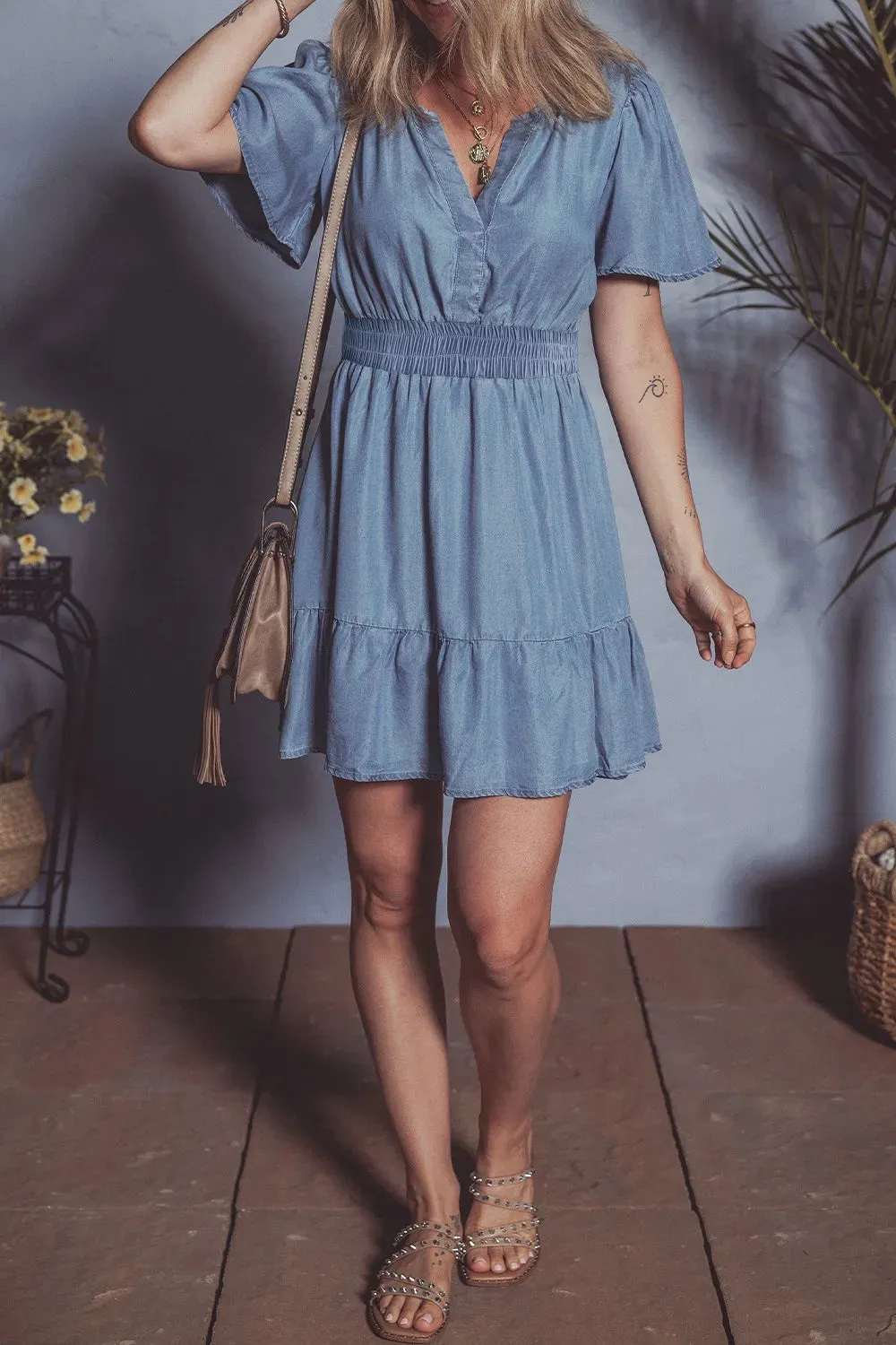 Ruffled Hem Smocked Flutter Sleeve Denim Mini Dress