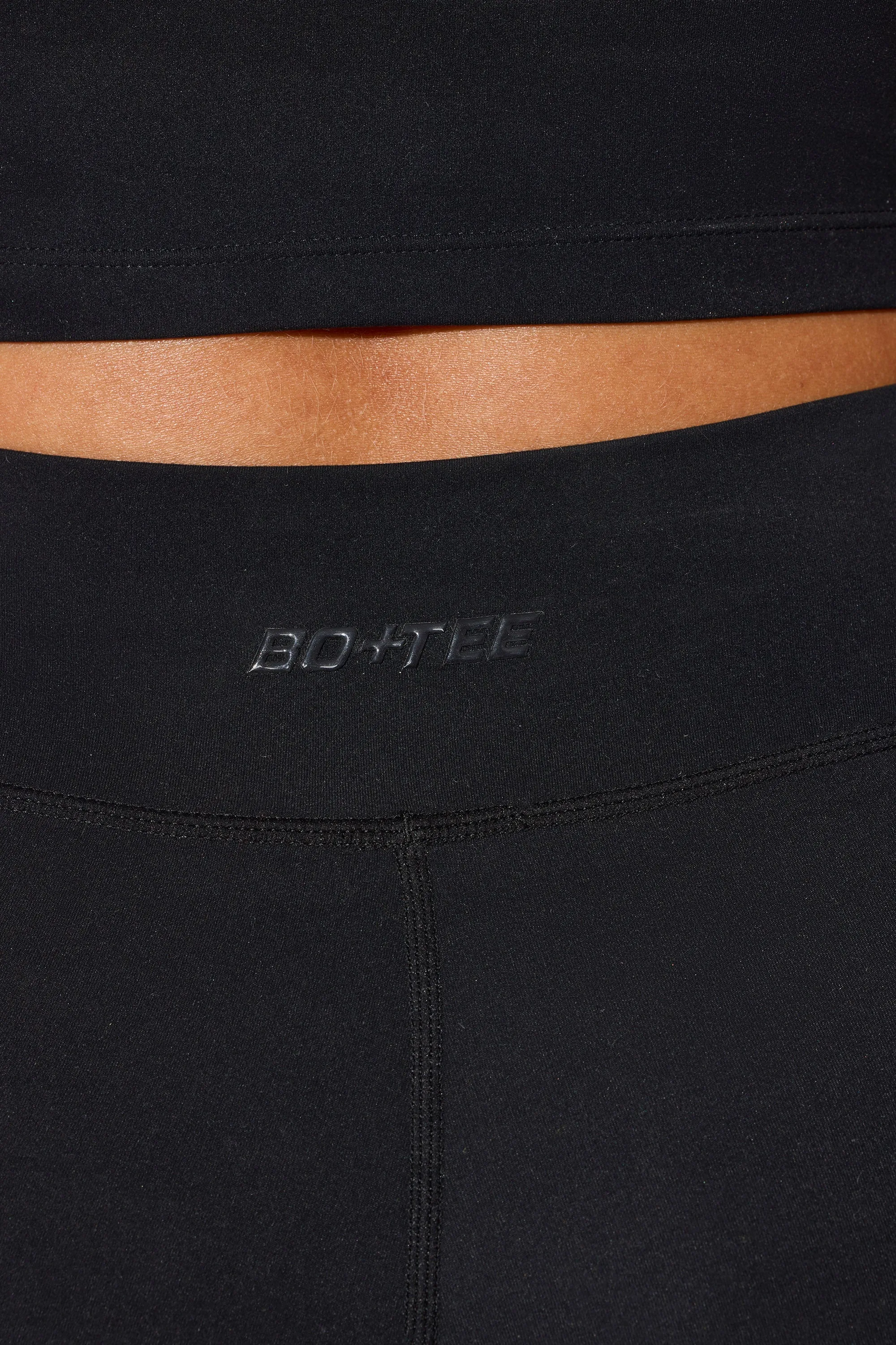 Shift - Twist Waist Mini Shorts with Pockets in Black