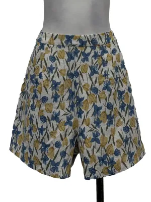 White Textured Shorts With Blue And Yellow Floral
